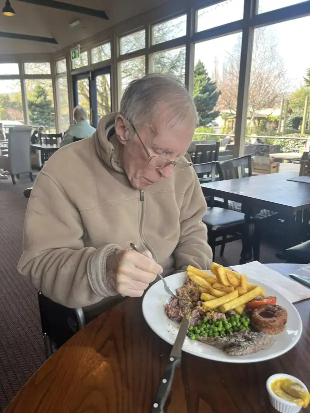 A gentleman enjoying a meal out at a pub